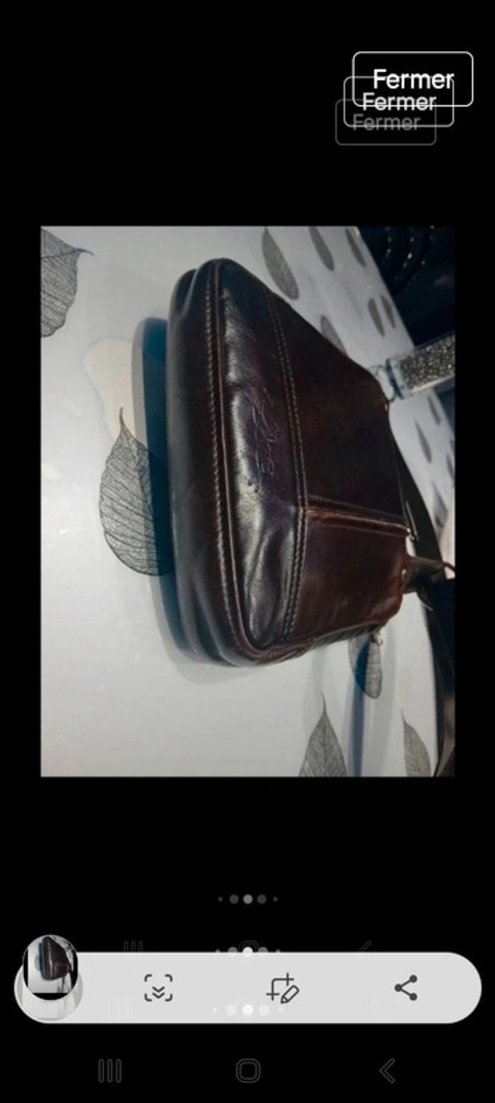 Pochette longchamp homme tt est visible sur les photos - photo numéro 6