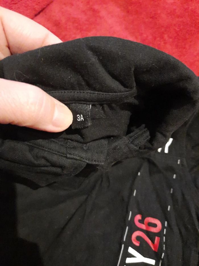 Polo noir - photo numéro 5