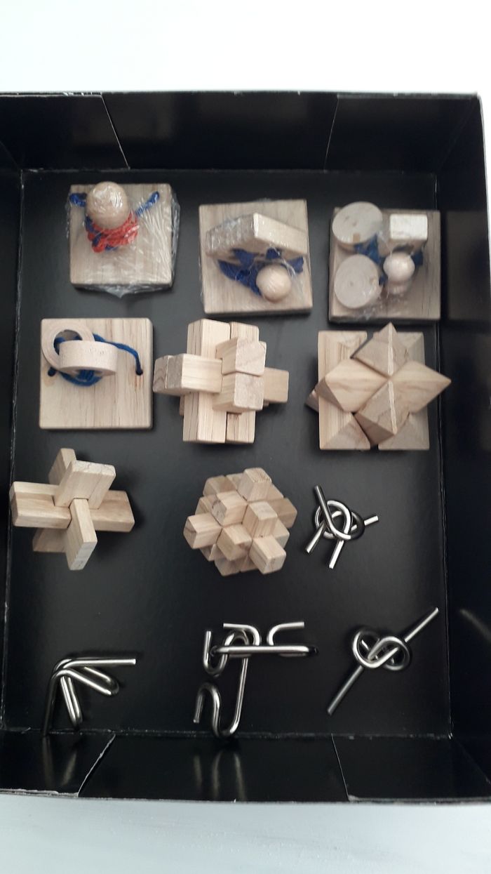 Jeu casse-têtes  en bois et en métal - photo numéro 2
