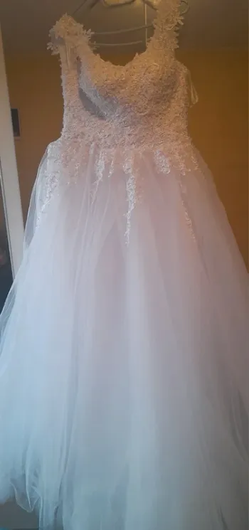 Robe de mariée lacées perle