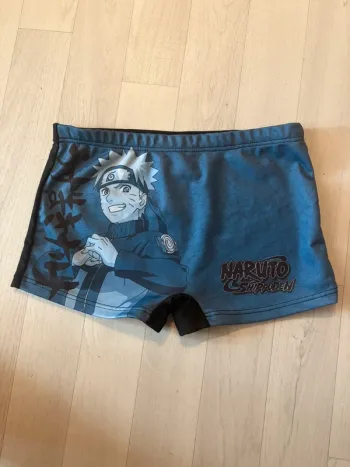 Maillot de bain naruto 12 ans très bon état motif devant et noir derrière