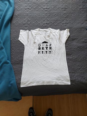 Tee-shirt femme neuf  "demain nous appartient " taille L