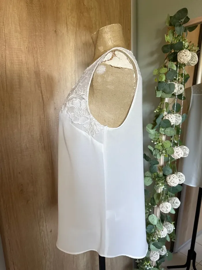Très jolie blouse sans manches femme - photo numéro 3