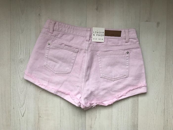 Short en jean couleur rose poudré taille basse à bords bruts marque Liquor N Poker - photo numéro 5