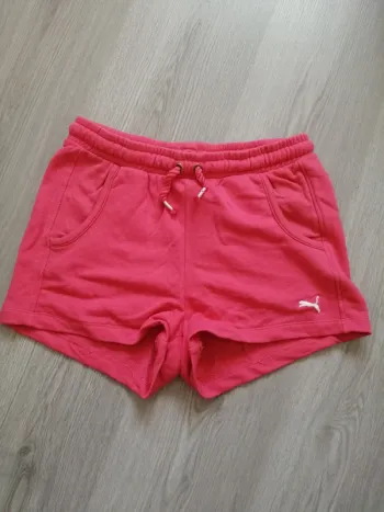 Short rose avec poches et lien à nouer / puma / (32/ 16ans)