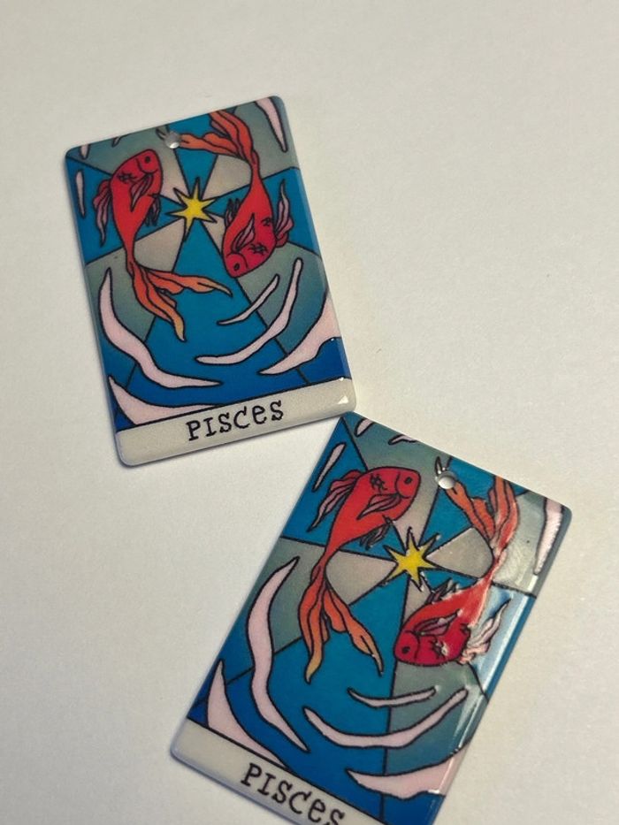 A184 Paire de grandes breloques Poissons recto verso