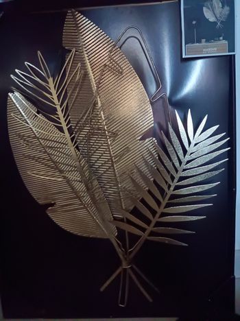 Décoration murale dorée