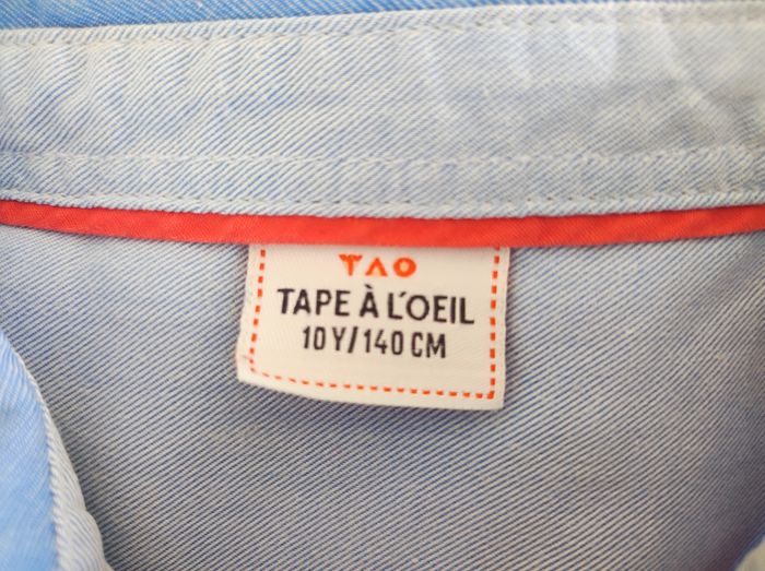 Lot de 5 vêtements garçon taille 10 ans 
1 chemise tape à l'oeil très bon état 
1 chemise El flamenco très bon état 
1 gilet Okaïdi très bon état 
1 veste sans manches Okaïdi neuf 
1 sweat Kiabi neuf - photo numéro 4