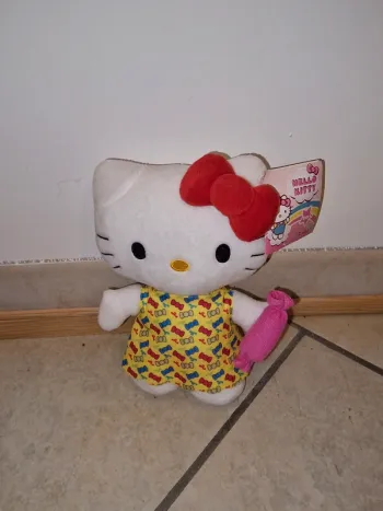 peluche hello kitty robe jaune 20 cm