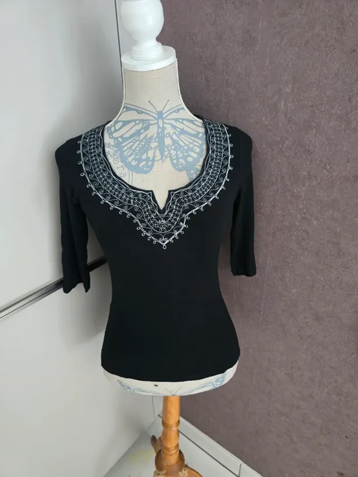 Haut côté femme taille 38 40 excellent état