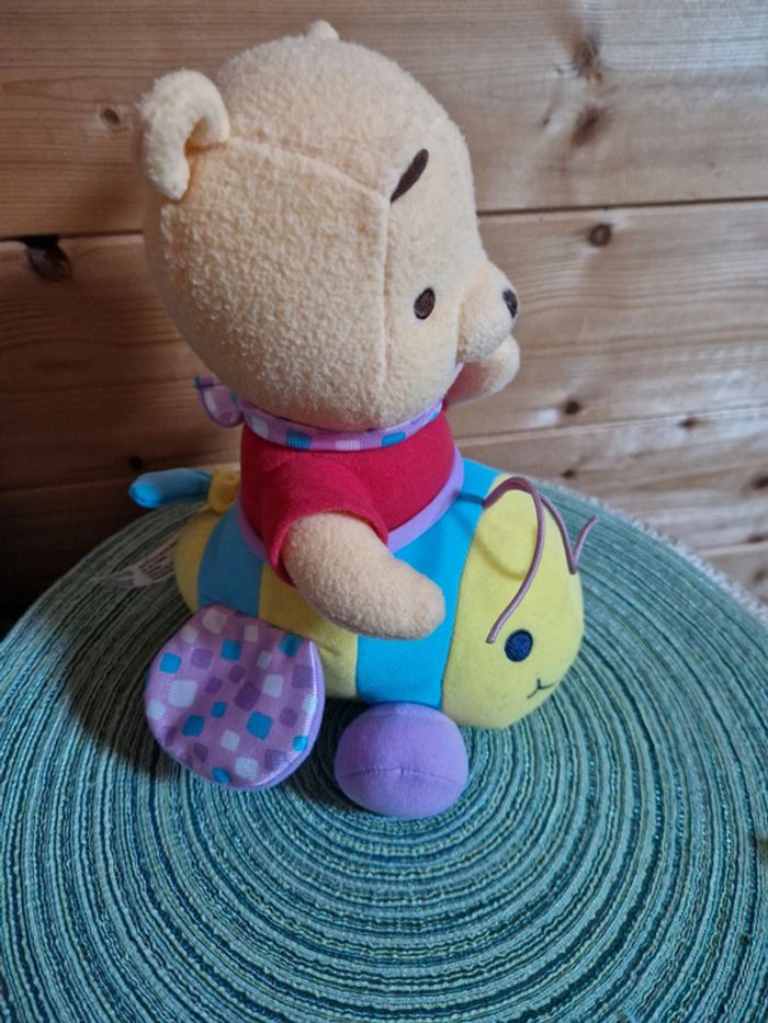 Winnie l'ourson sur son papillon - photo numéro 3