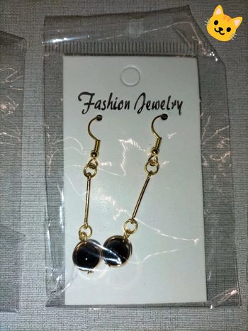 Boucles d'oreilles pendantes perles noires