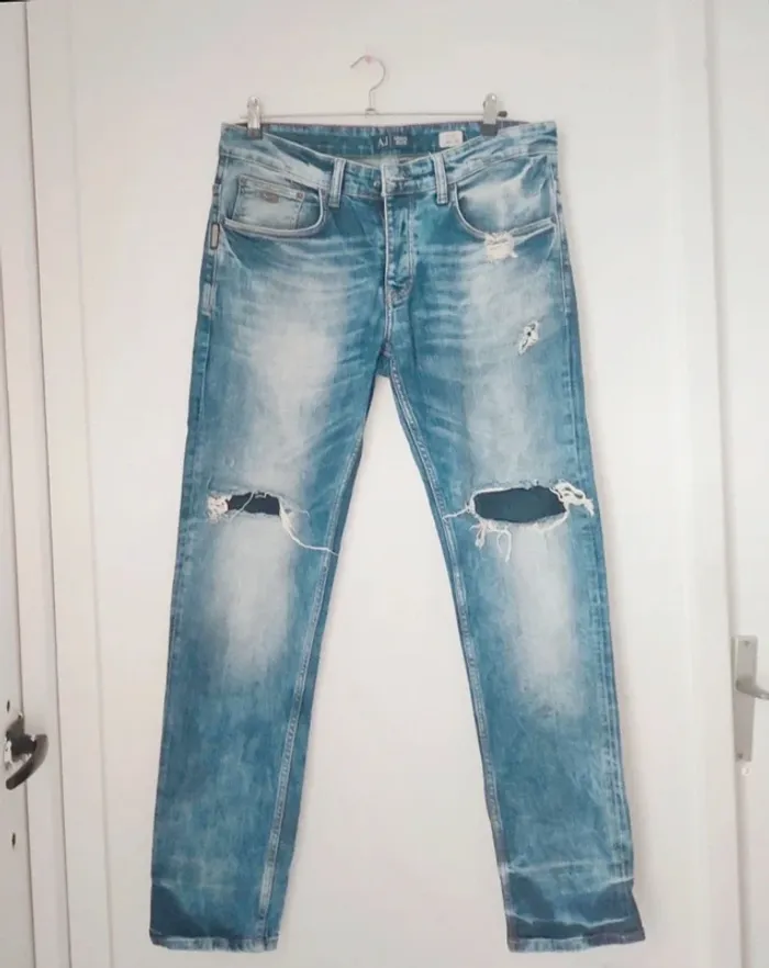 Jeans slim fit à trou homme