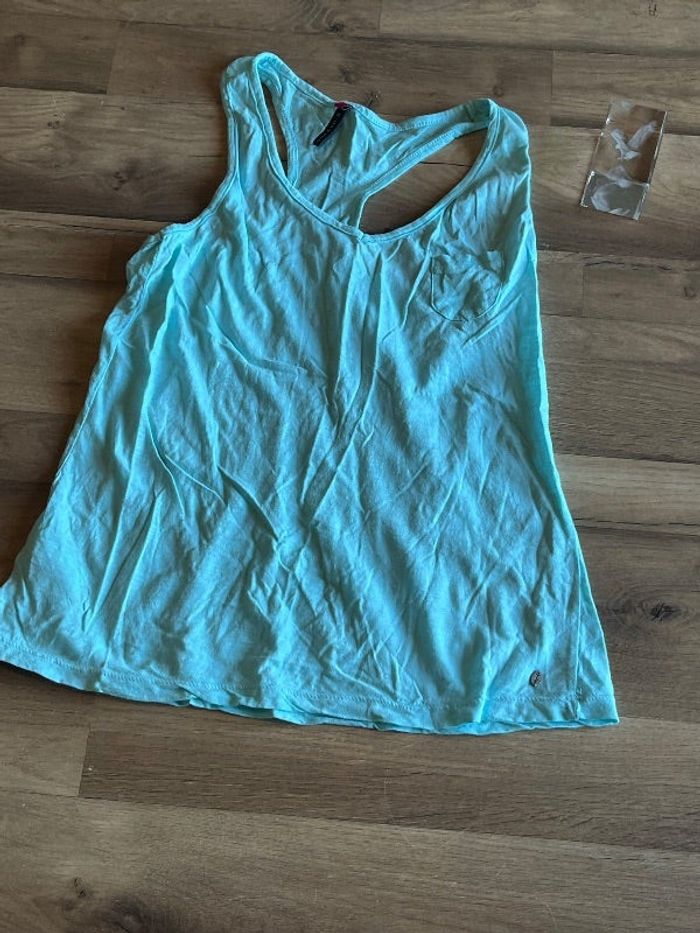 Je vend un débardeur femme taille L très bon etat