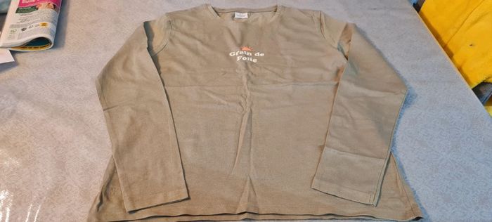 Tee-shirt tape a l'œil 14 ans