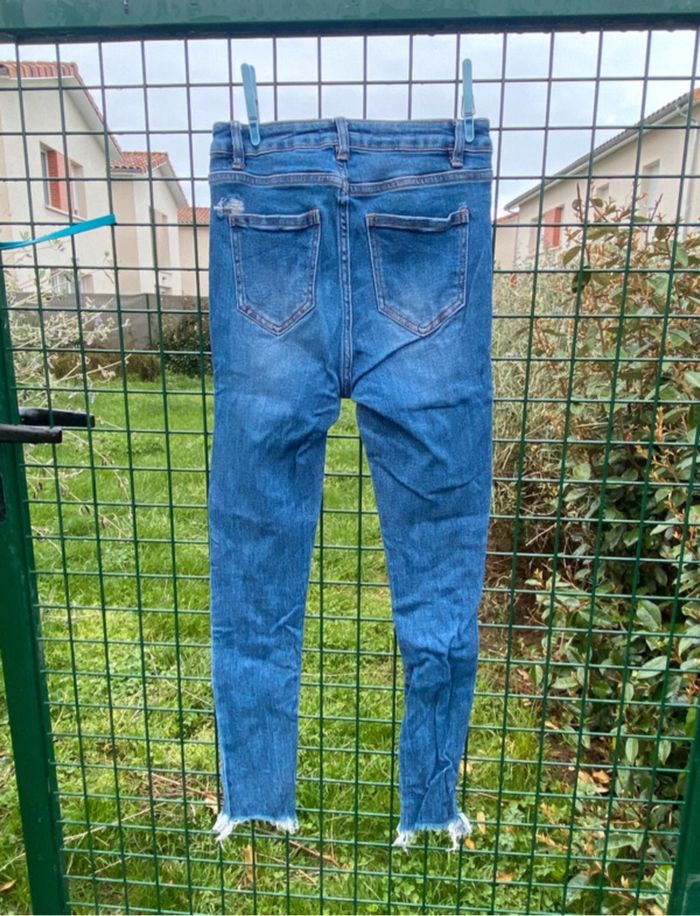 Jeans trouée - photo numéro 2