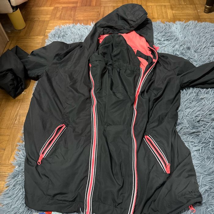 Coupe vent veste de portage
