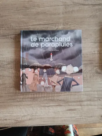 Livre pour enfants "le marchand de parapluies"