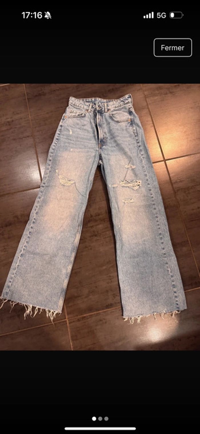 Très beau jeans à trous