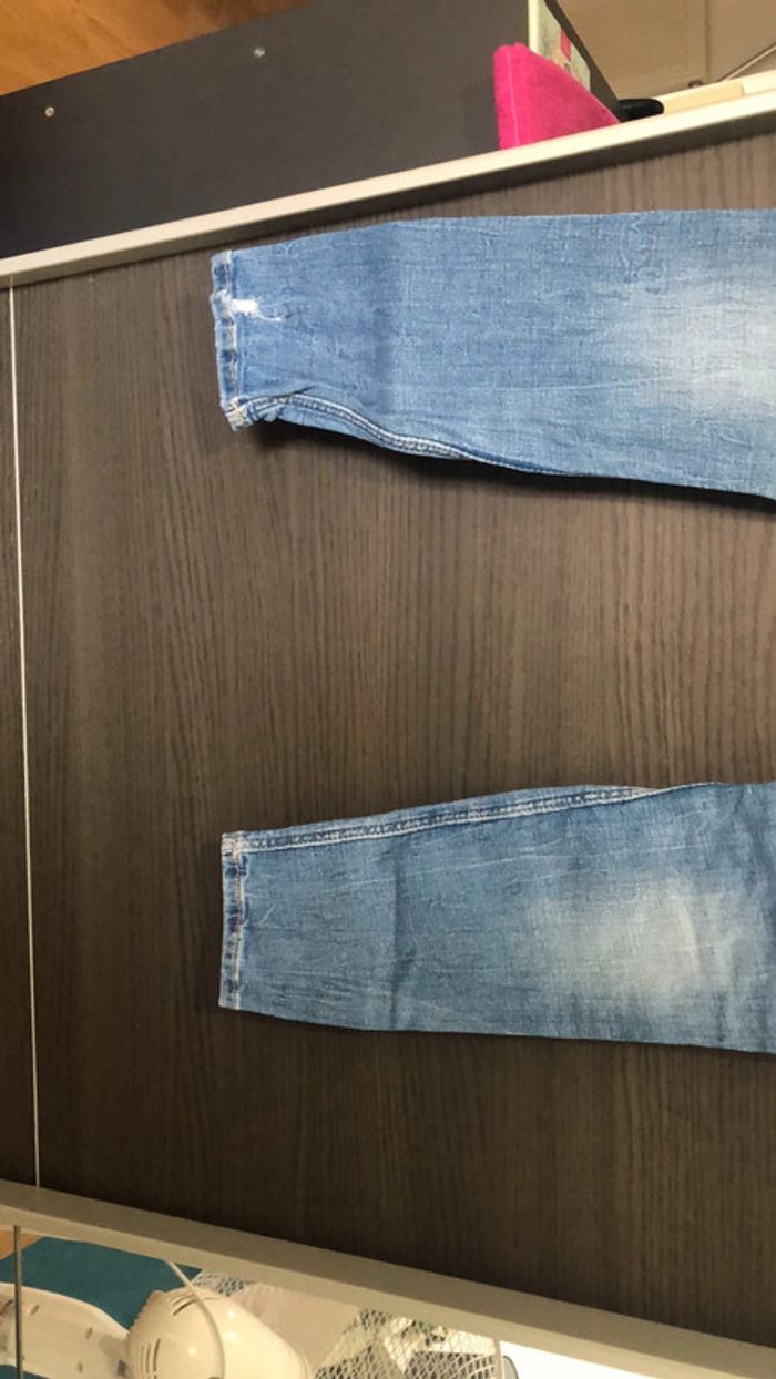 Jeans troué - photo numéro 7
