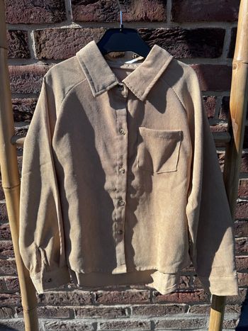 Chemise taille 10 ans 