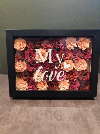 Cadre avec fleurs en papier et texte 