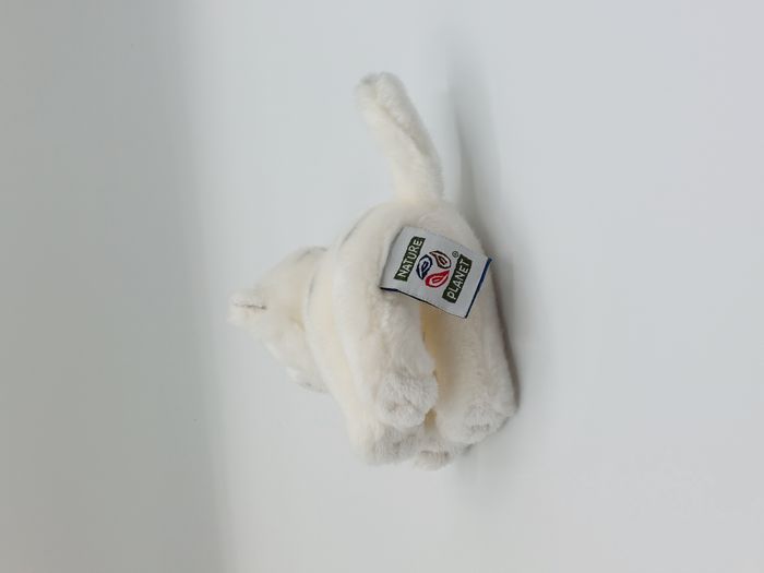 Petite peluche doudou tigre blanc NATURE PLANET plan international yeux bleus - photo numéro 4