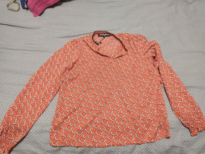 Blouse orange motifs asimétriques