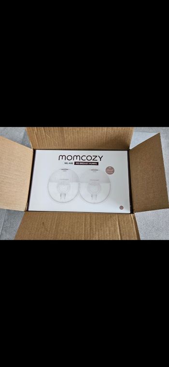 Tire lait momcozy M5  NEUF Sous emballage