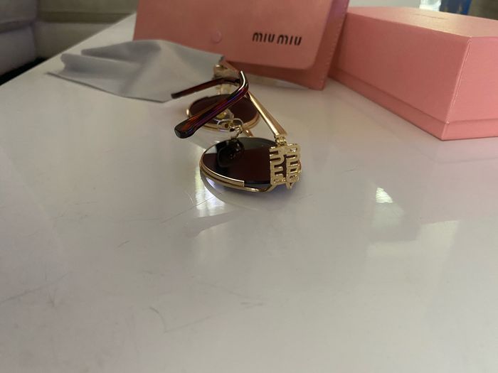 Lunettes de soleil Miu Miu - photo numéro 8