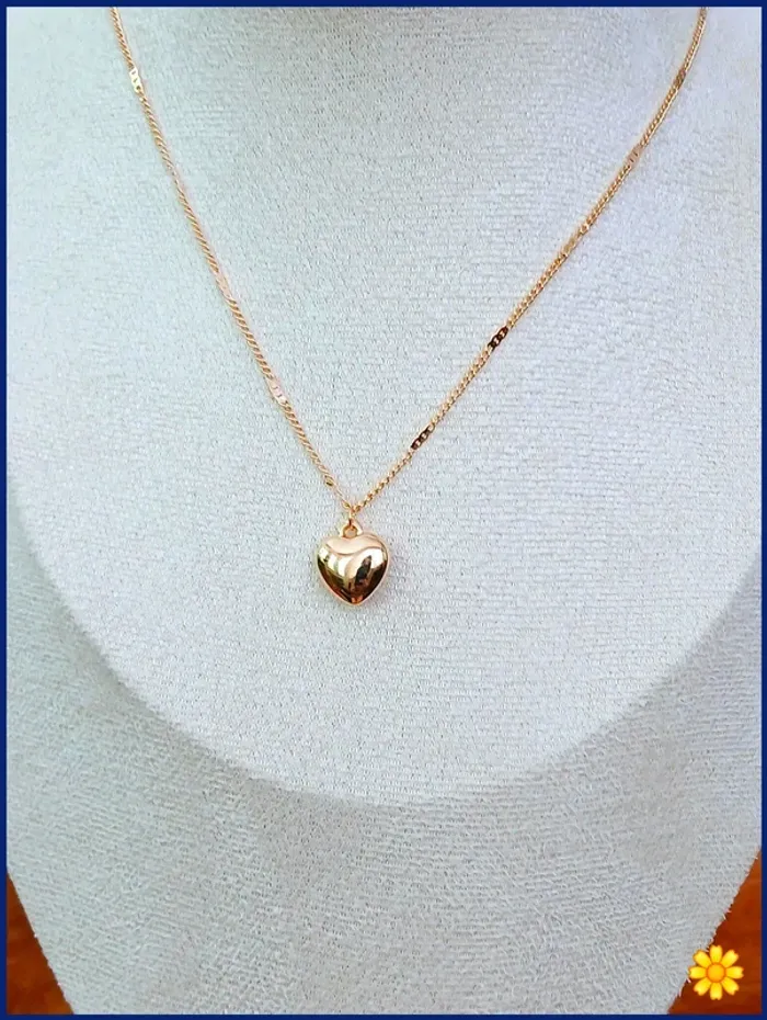 Collier cœur doré tendance romantique été 2025