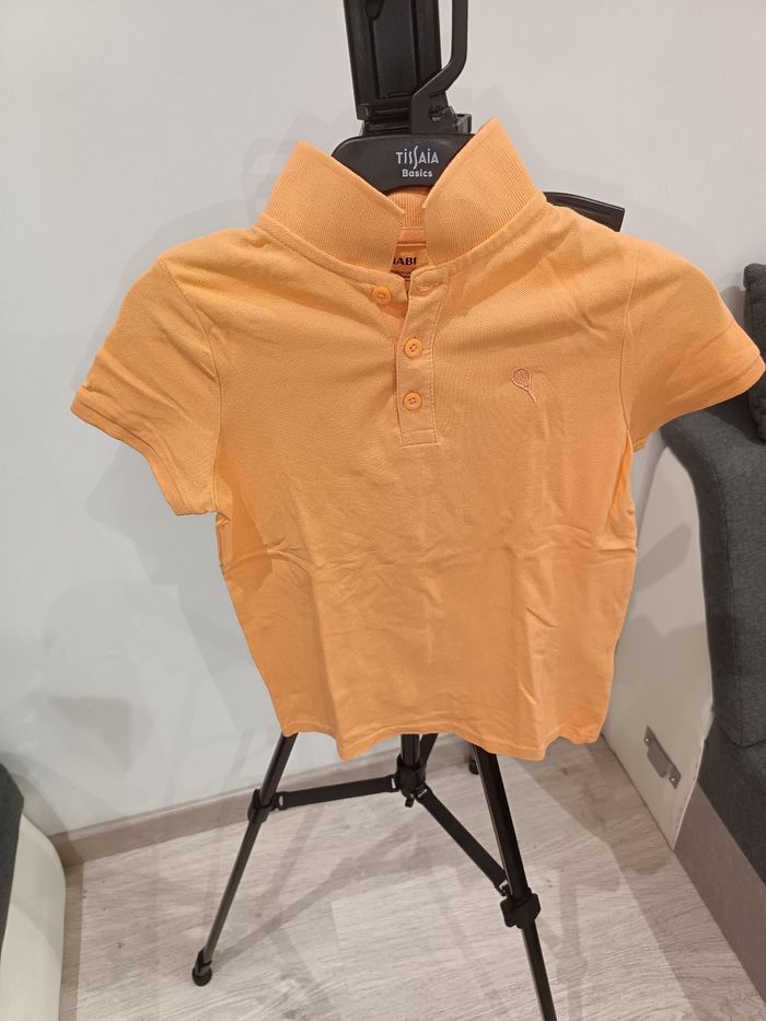 Polo orange 8 ans Kiabi