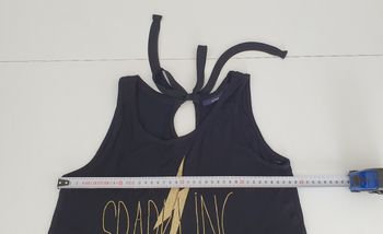 Débardeur noir et doré en S avec un noeud