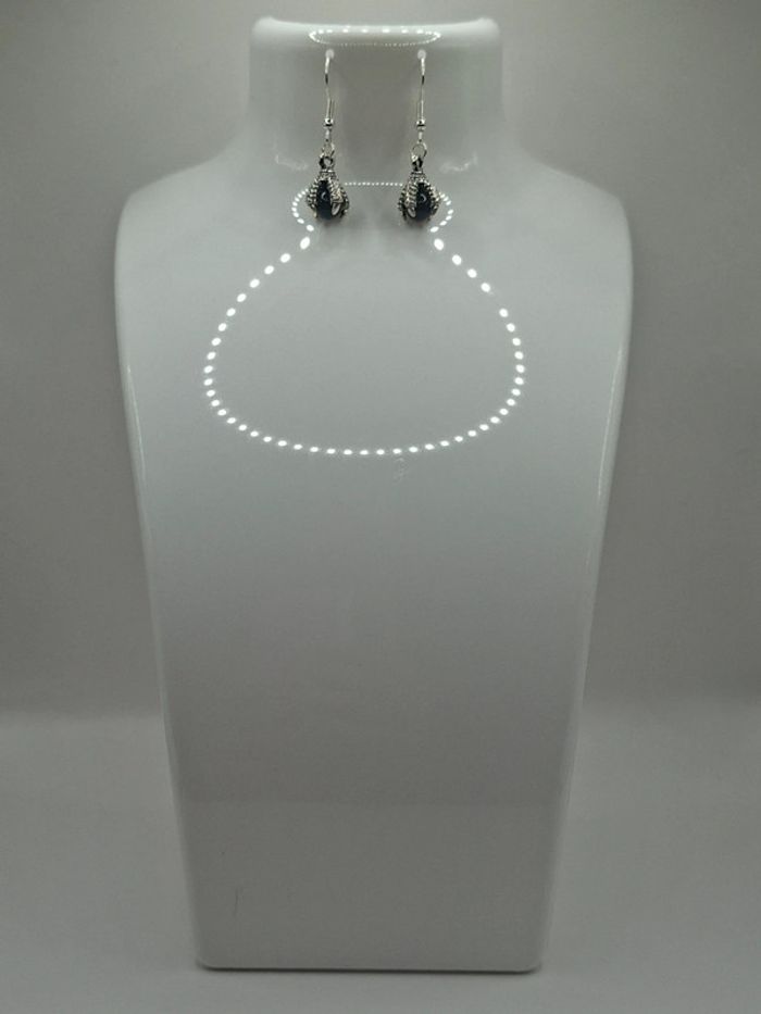 Boucle d'oreille patte de dragon