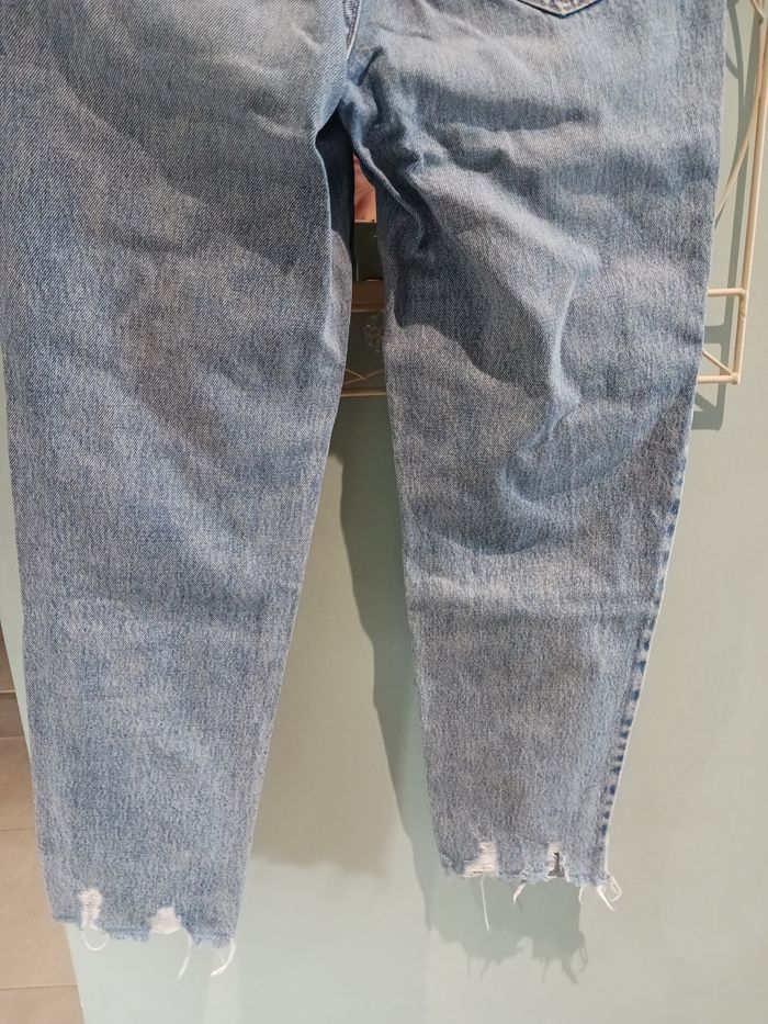 Jeans troué - photo numéro 7