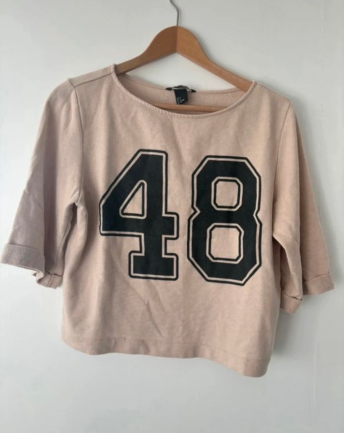 Sweat H&M rose pâle manches 3/4 taille S – écriture noire