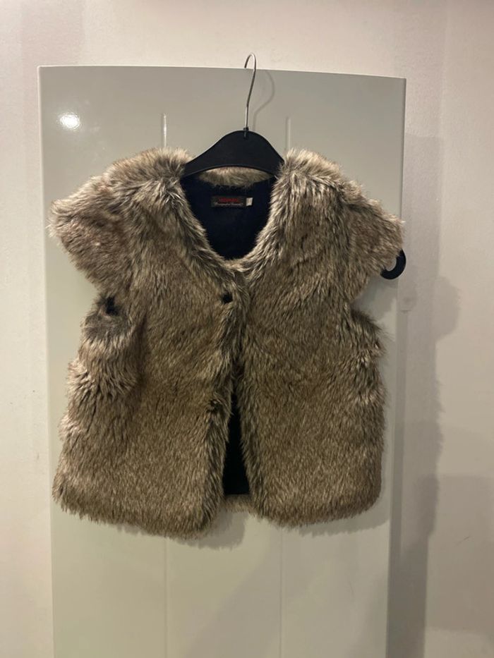 Gilet sans manche 7 ans