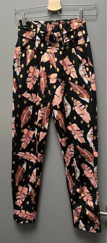 Pantalon plumes et détails dorés