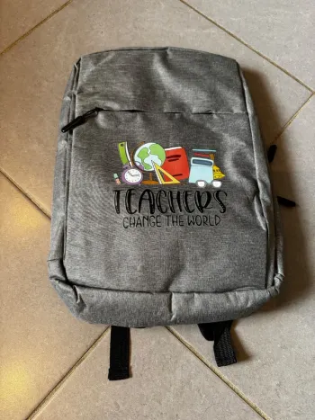 Sac à dos en Polyester avec Citation "Teachers change the world"