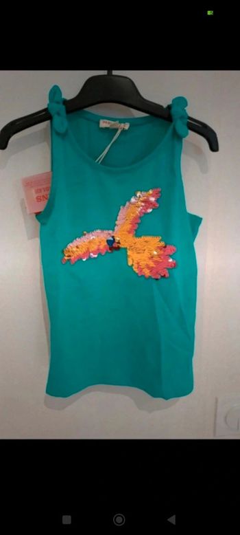 Top neuf à sequins 4 ans