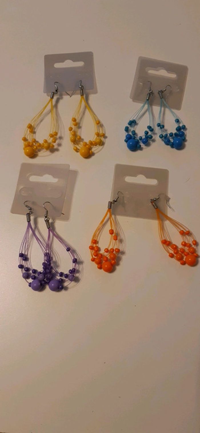 Boucles femme neuves