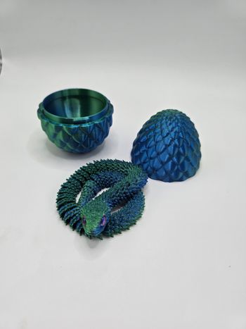 🐉Œuf style dragon en 3D bleu/vert avec son serpent articulé assorti🐍.