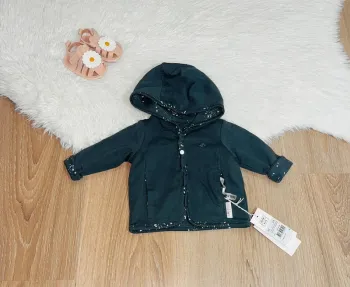 Veste à capuche neuve avec étiquette