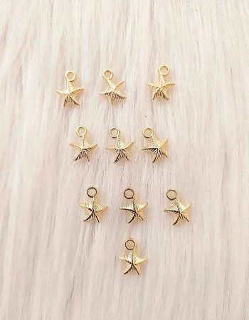Lot de 10 breloques pendentifs étoiles de mer coloris doré