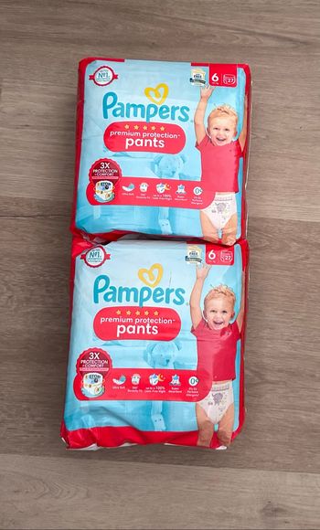 2 pasuets pampers premium protection taille 6 pants