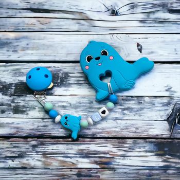 Anneau de dentition avec clip