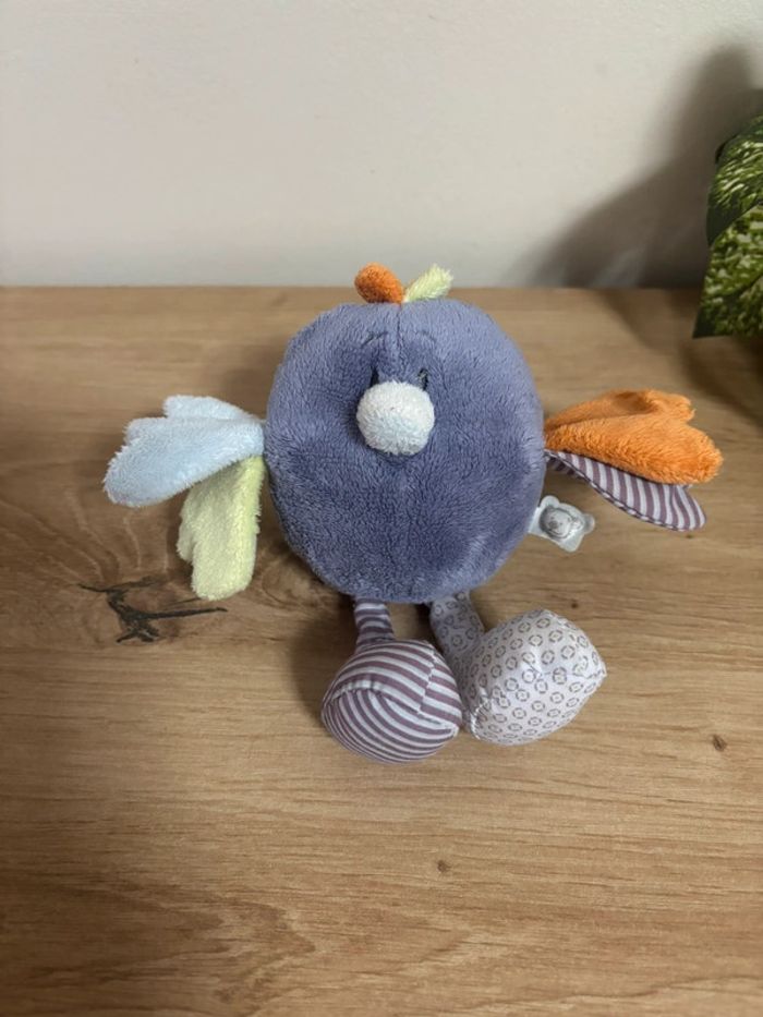Doudou oiseau violet vert bleu orange noukie s