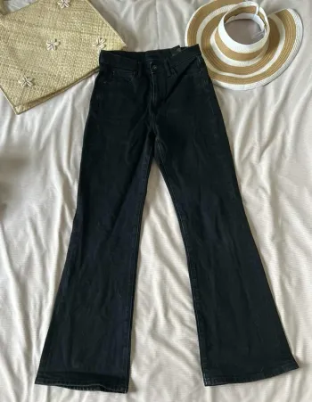 Jean noir flare taille haute Uniqlo – W24 (61 cm)  taille 34