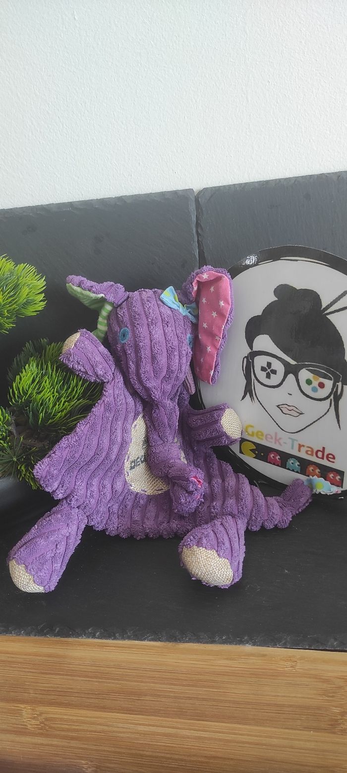 Les Déglingos Sandykilos l'éléphant Baby doudou plat violet rose vert étoiles rond noeud