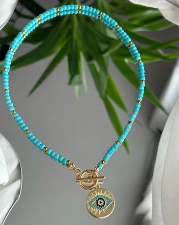 Collier perles bleues & pendentif œil porte-bonheur neuf, acier inoxydable